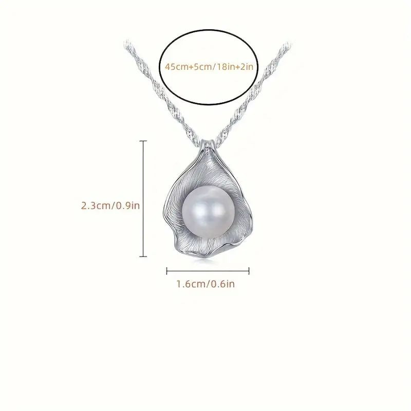 Elegante Wellenkette mit Kunstperle auf Blüte